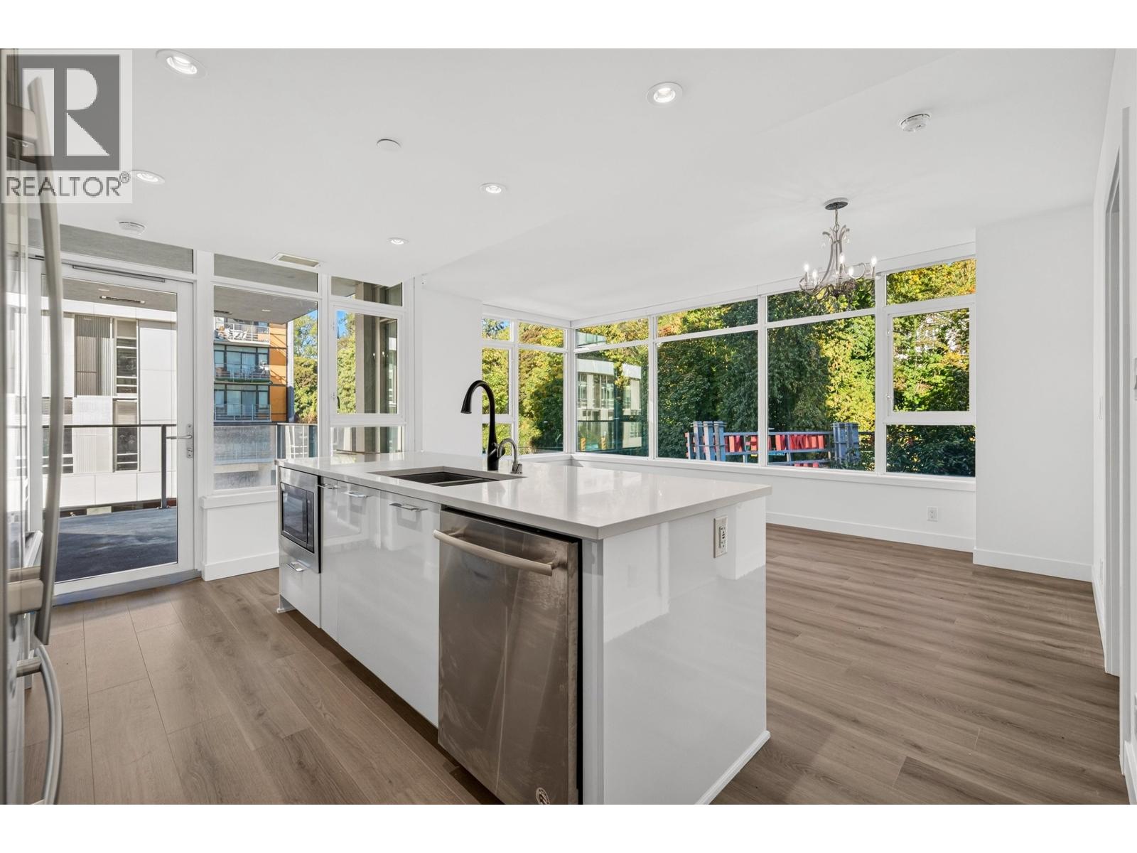 310 8538 River District Crossing Property Photo 2