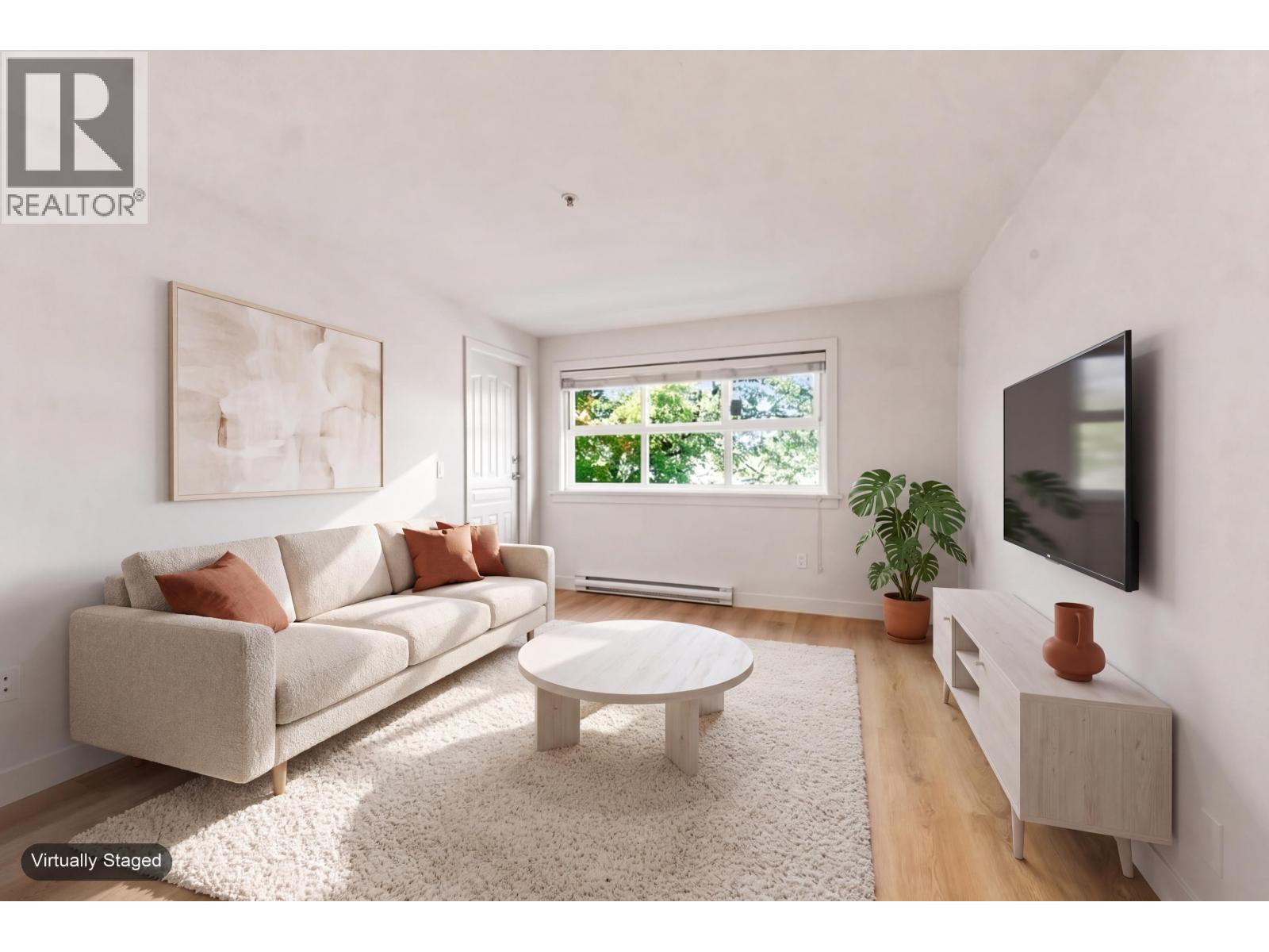 301 2928 Commercial Drive Property Photo 1