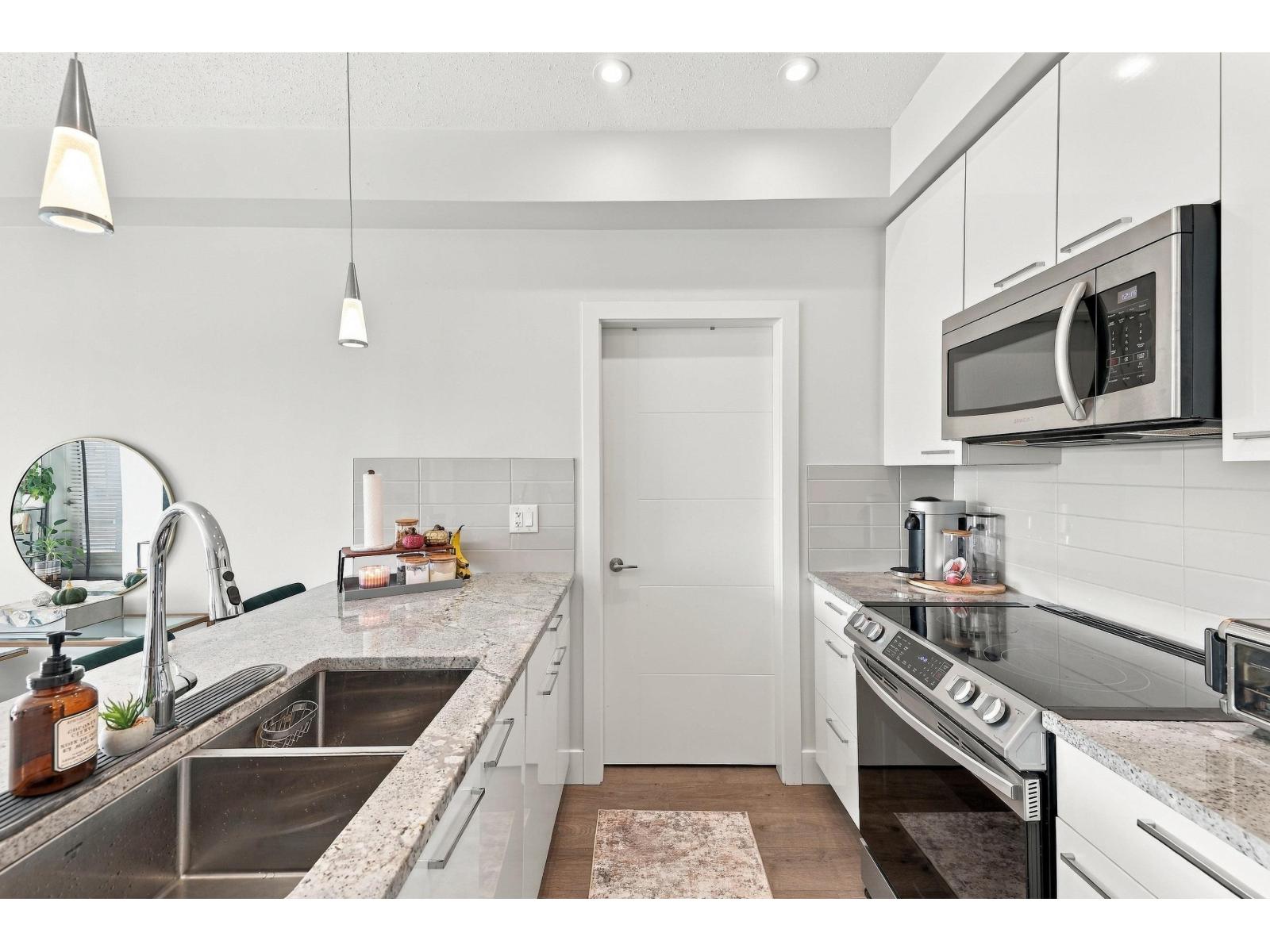 210 5485 Brydon Crescent Property Photo 2