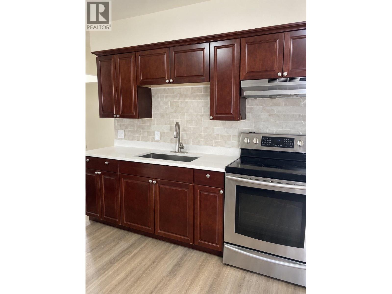 Upper 7429 CANADA WAY Property Photo 1