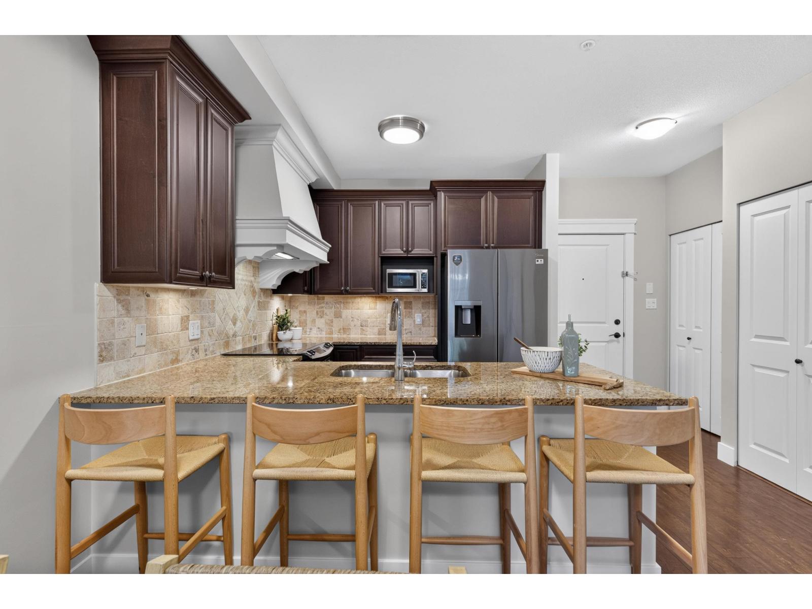 107 19530 65 AVENUE Property Photo 1