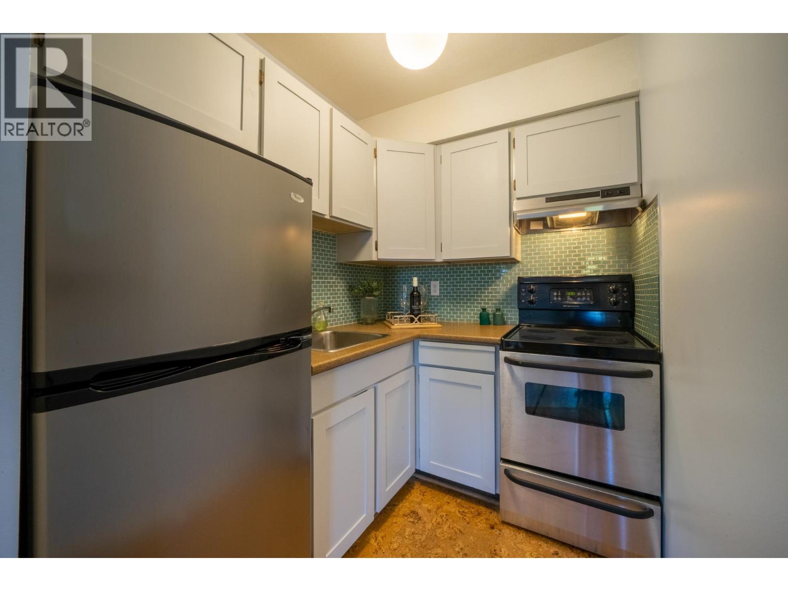 210 3465 Glen Drive Property Photo 2