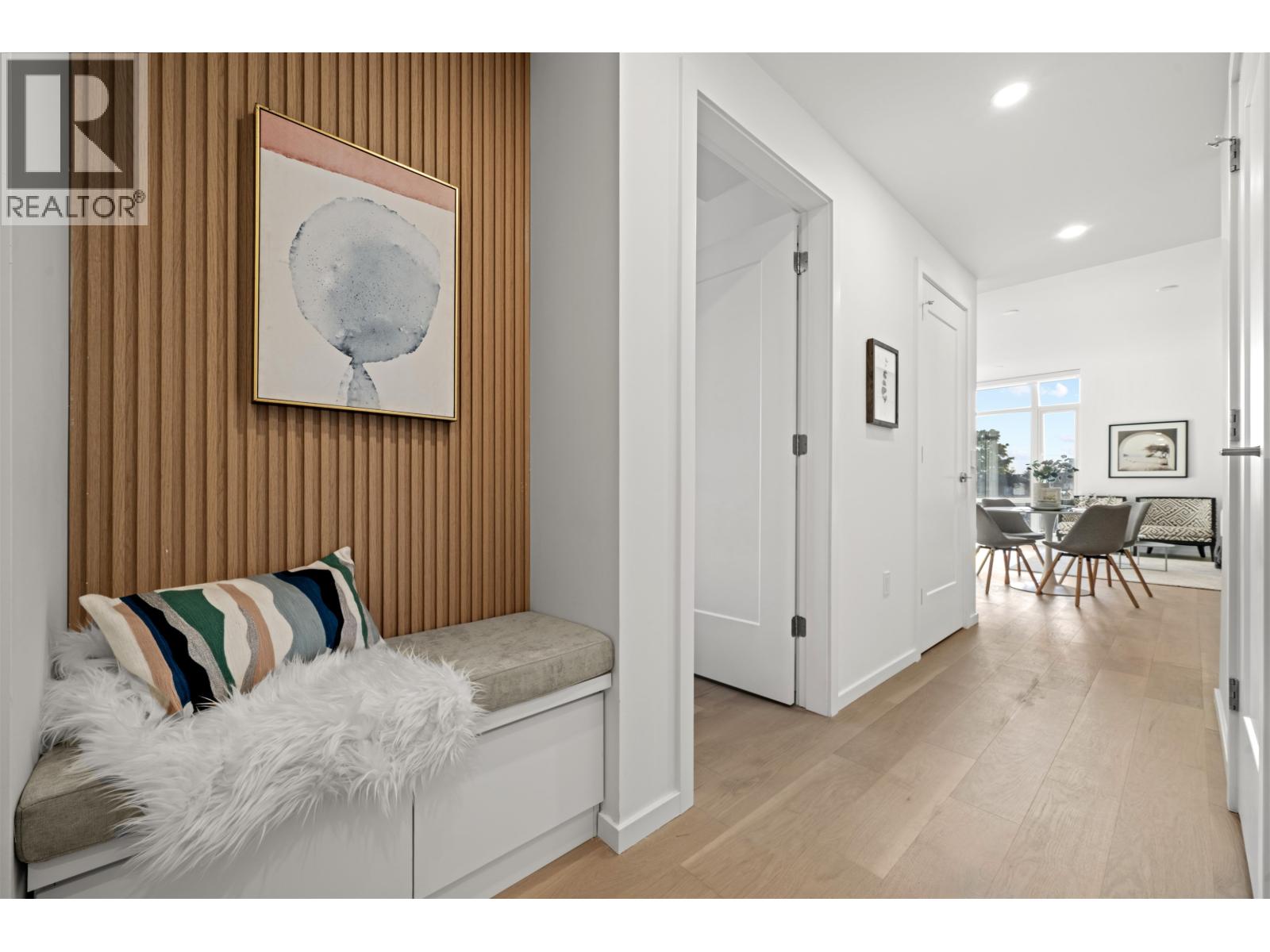 203 8486 OAK STREET Property Photo 1