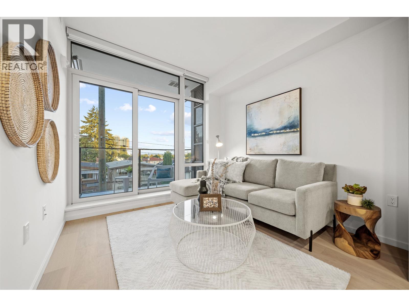 209 8486 OAK STREET Property Photo 1