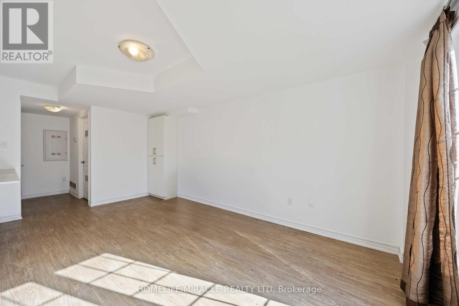 11 - 244 Penetanguishene Road Property Photo 7