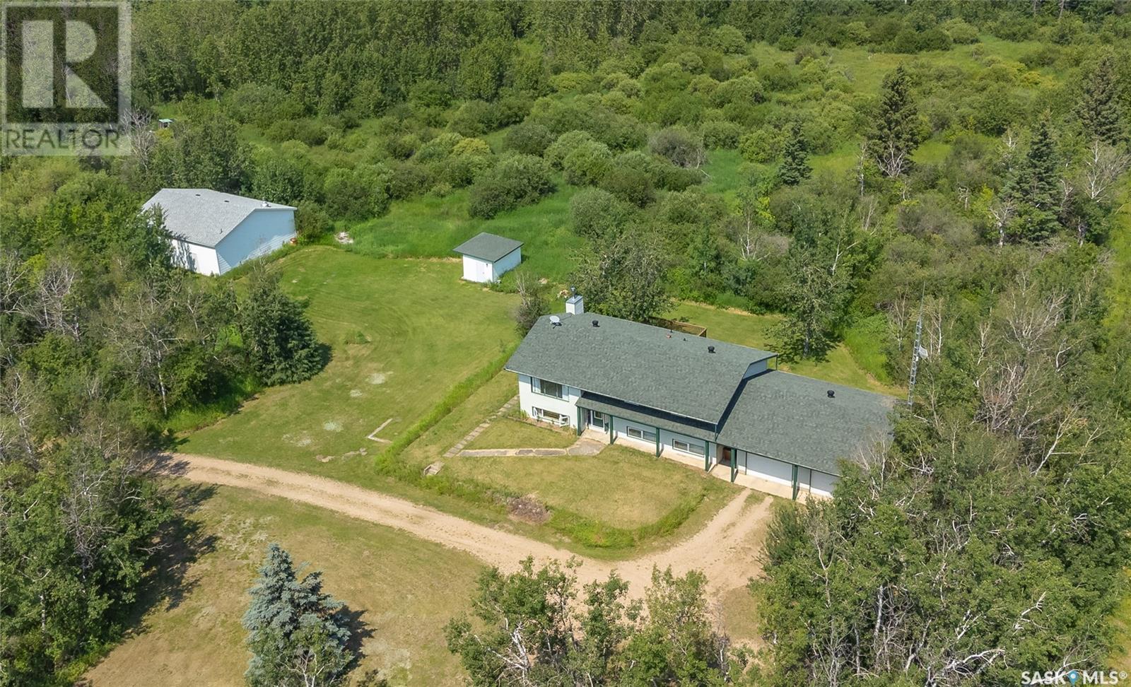 Spruce Home Acreage Property Photo 1