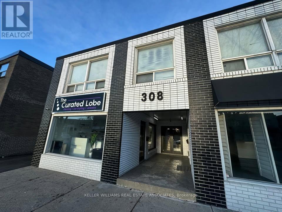 2 - 308 LAKESHORE ROAD E Property Photo 1