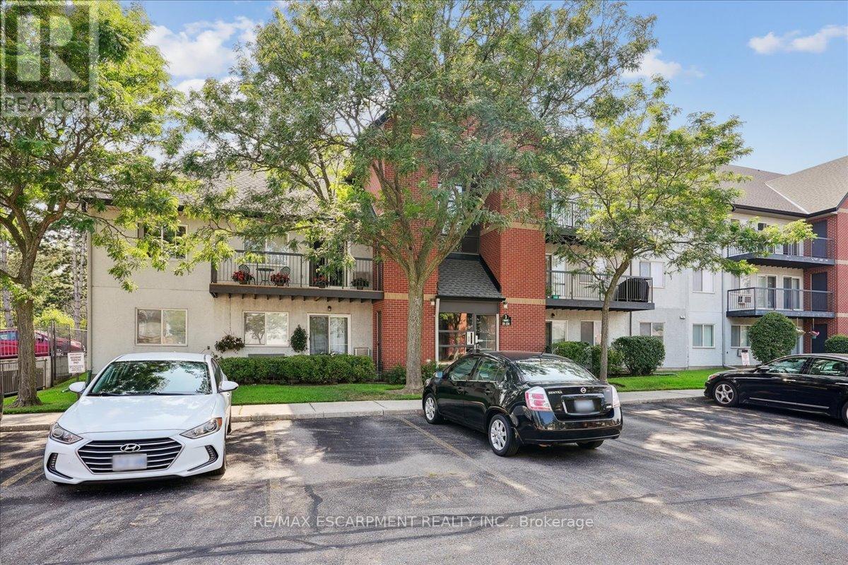 312 - 1450 Glen Abbey Gate Property Photo 1