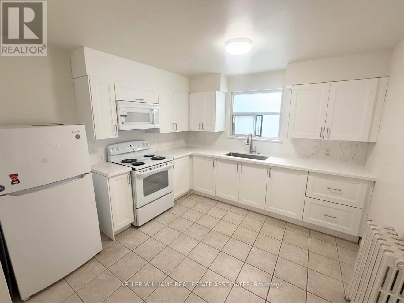 3 - 237 LAKESHORE ROAD E Property Photo 1