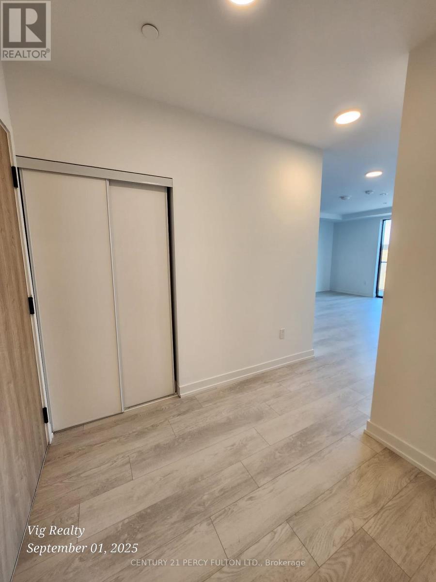 205 - 801 THE QUEENSWAY AVENUE Property Photo 1