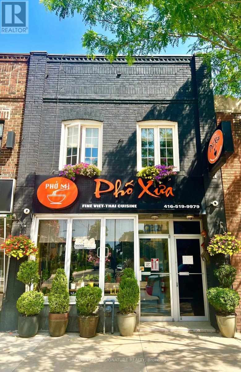 . - 1768 St Clair Avenue W Property Photo 1