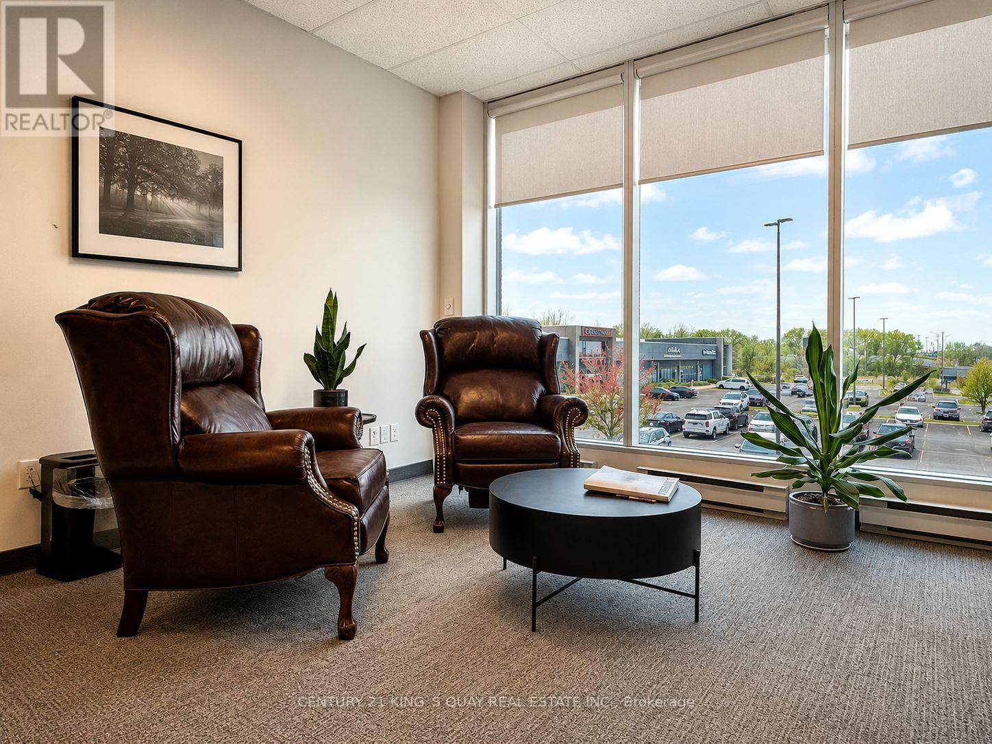 208 - 1075 North Service Road W Property Photo 2