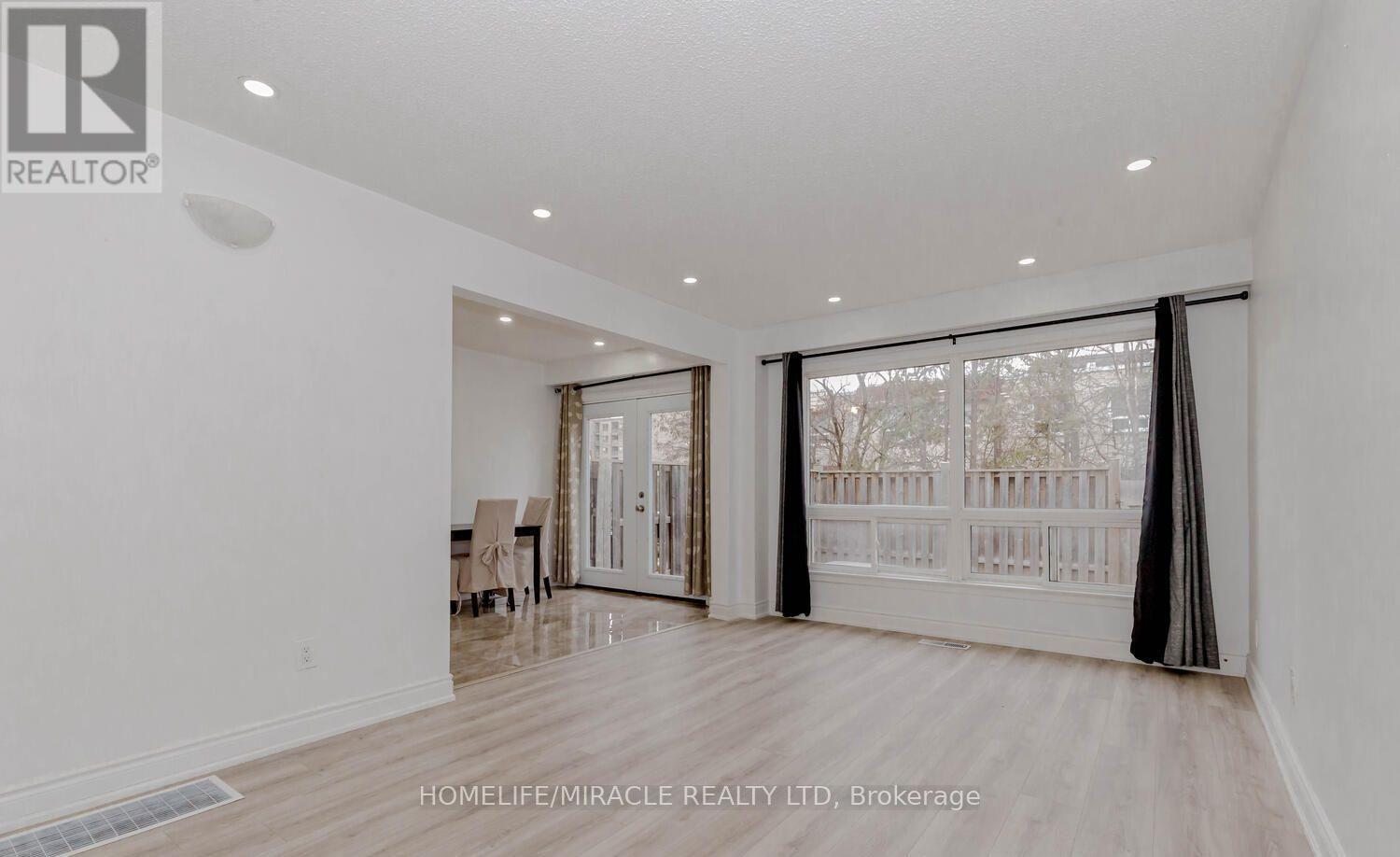 56 - 7500 GOREWAY DRIVE Property Photo 1