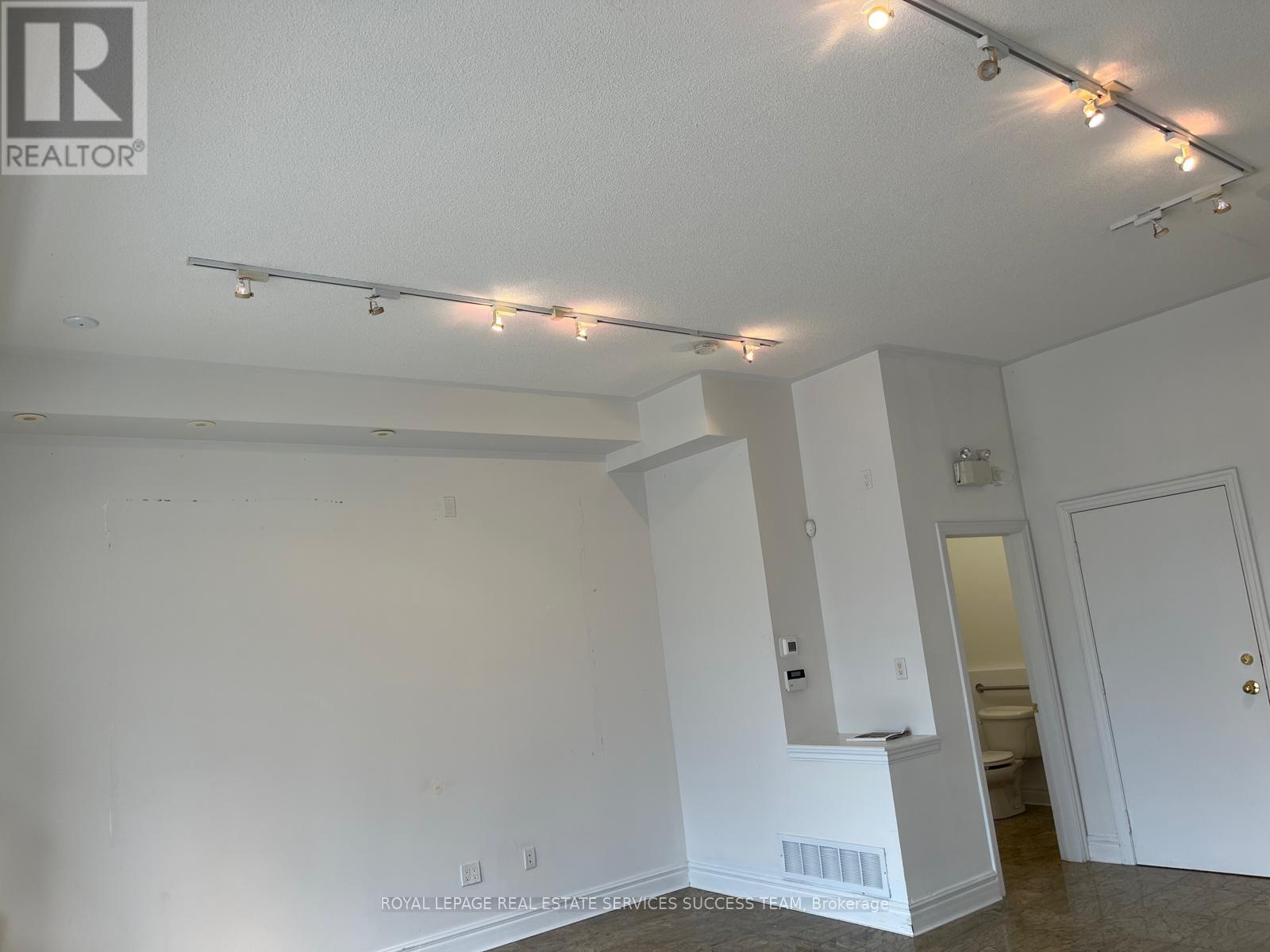 12 - 167 Lakeshore Road E Property Photo 2