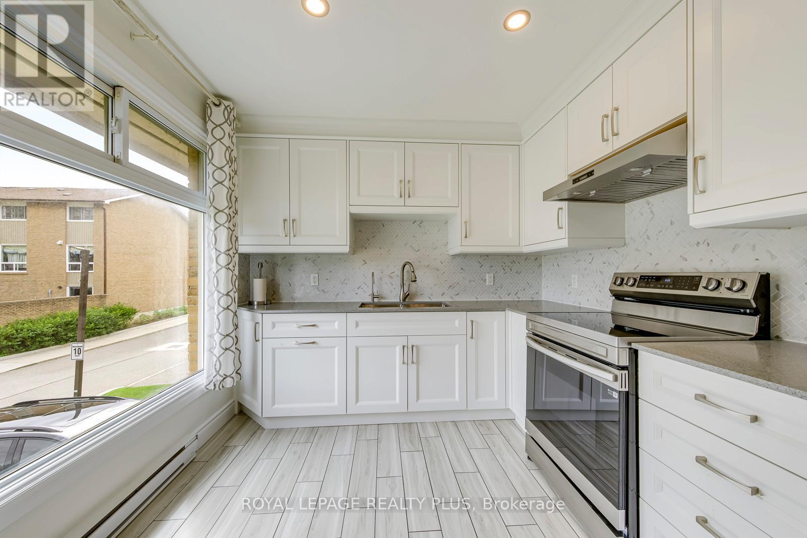 1 - 640 Rathburn Road E Property Photo 13