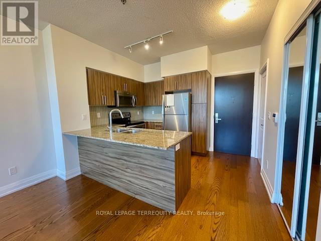 323 - 65 Speers Road Property Photo 4