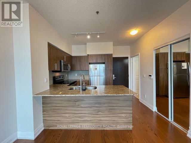 323 - 65 Speers Road Property Photo 5