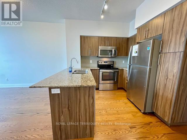 323 - 65 Speers Road Property Photo 7