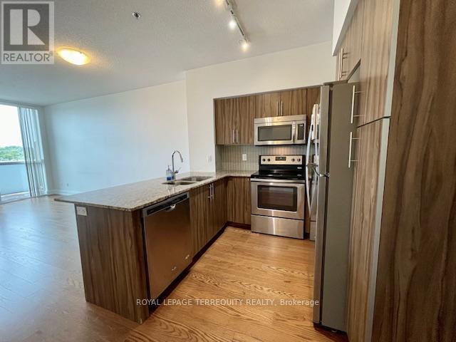 323 - 65 Speers Road Property Photo 8