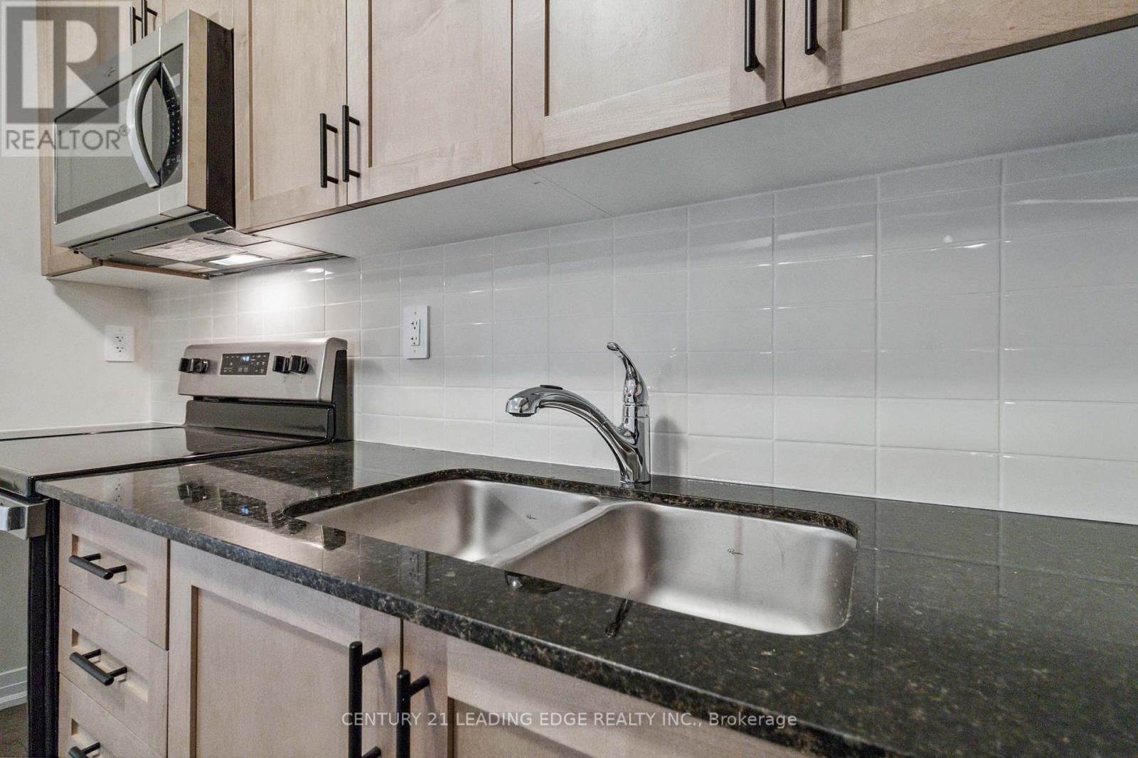 128 - 1569 Rose Way Property Photo 18