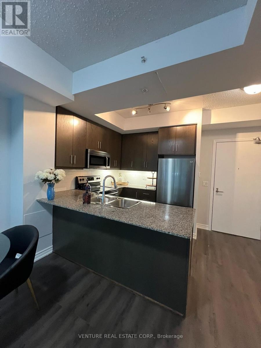 718 - 15 James Finlay Way Property Photo 4
