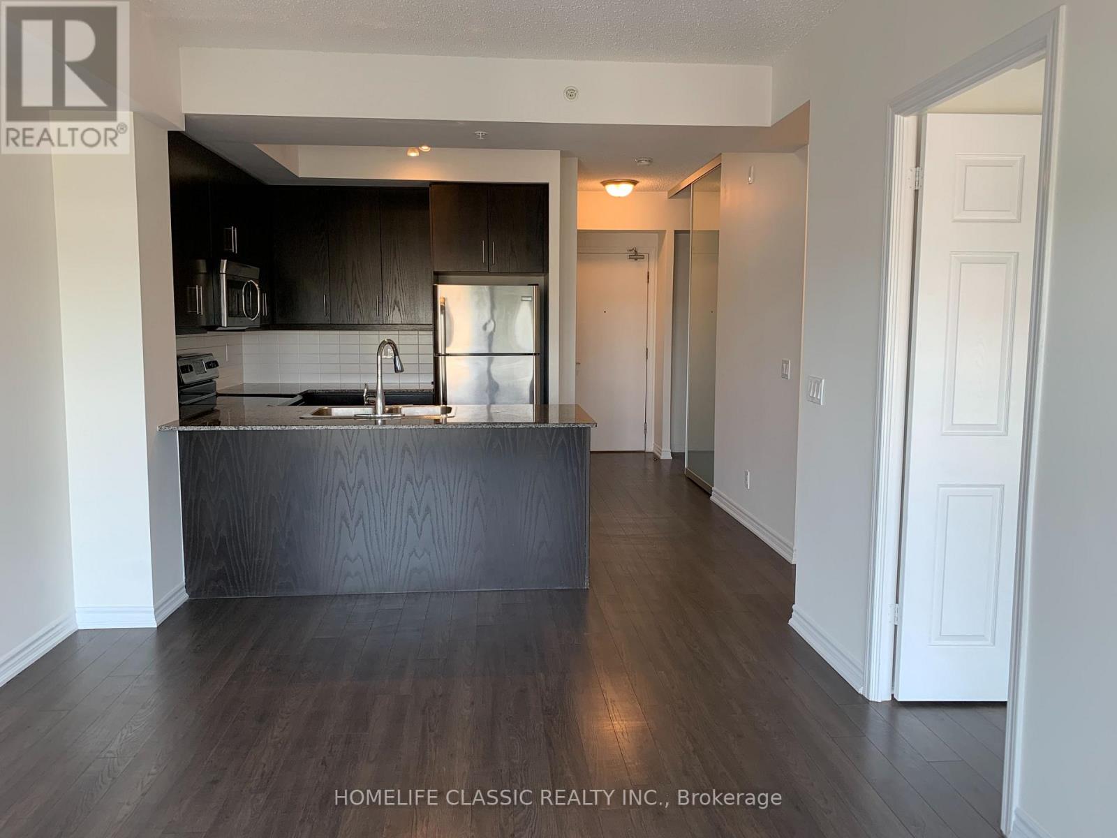 611 - 15 James Finlay Way Property Photo 3