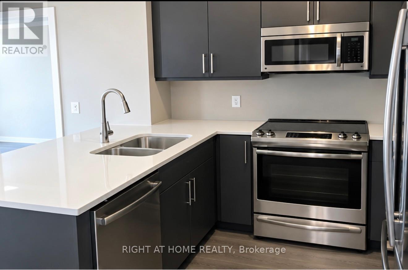 114 - 1105 Leger Way Property Photo 4