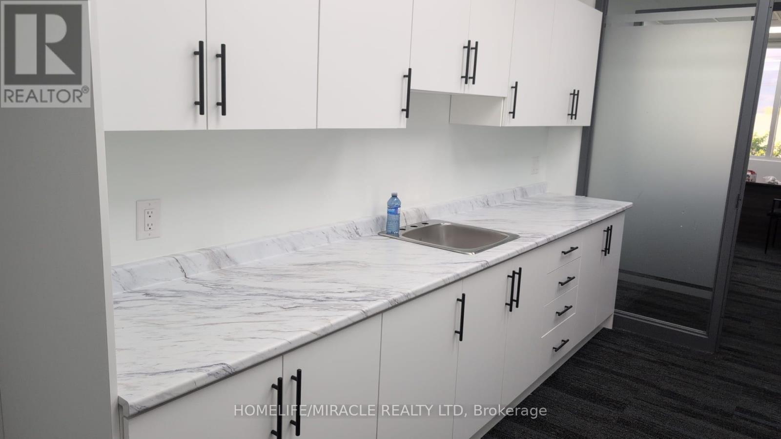 203 - 6660 Kennedy Road Property Photo 6