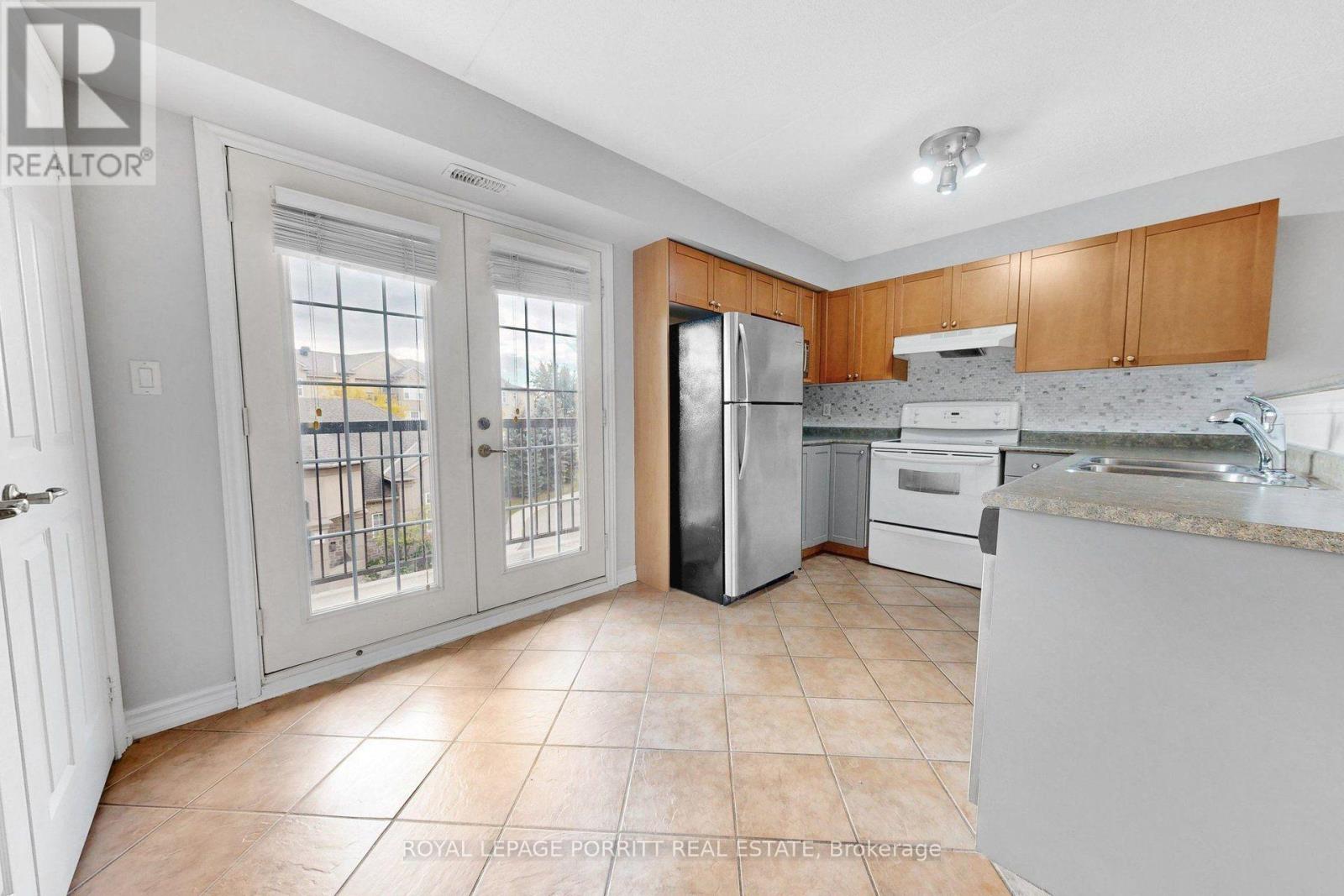 302 - 2085 Appleby Line Property Photo 11