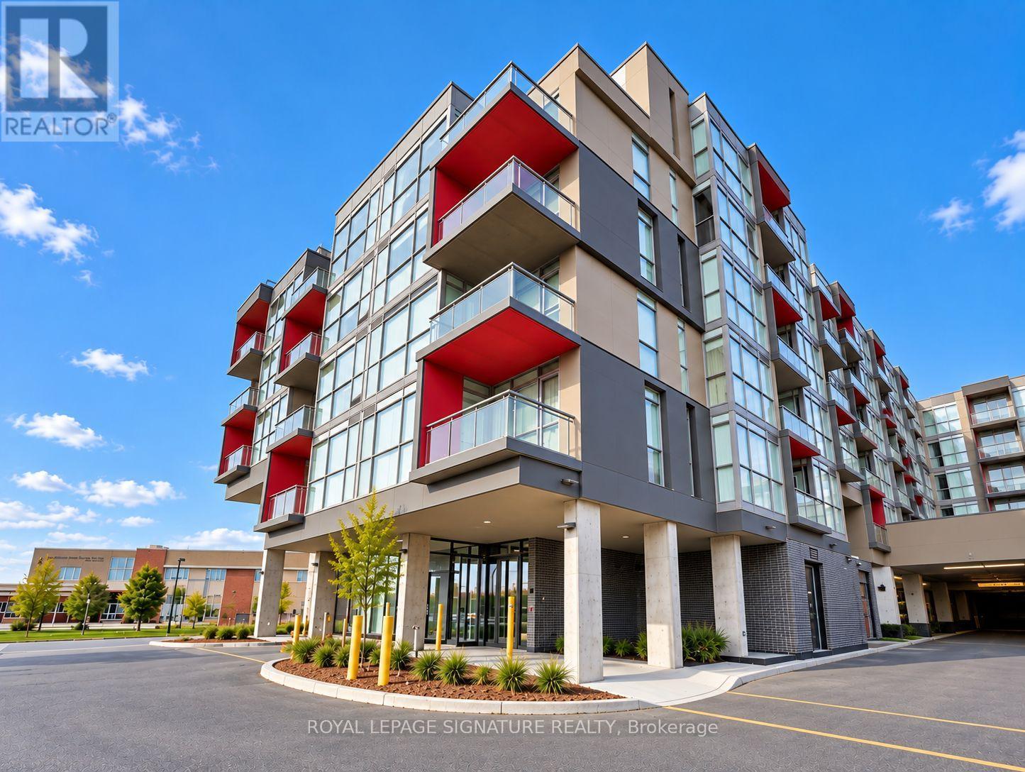 D313 - 5220 Dundas Street Property Photo 1