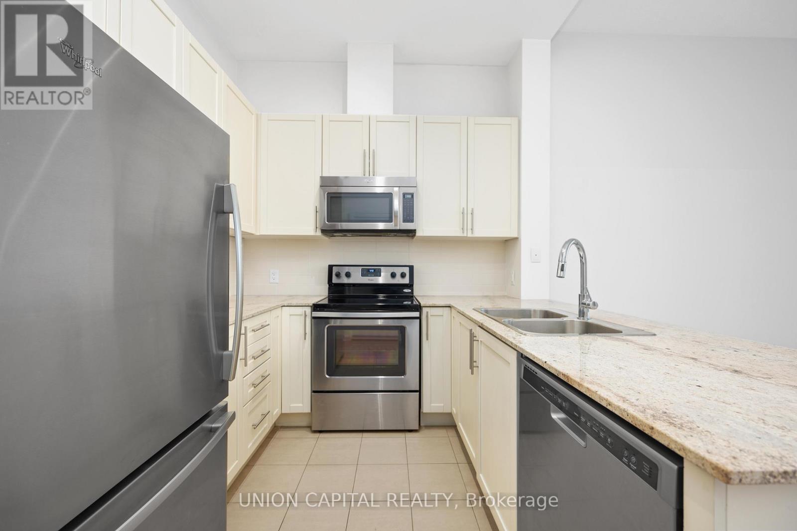 207 - 3985 Grand Park Drive Property Photo 4