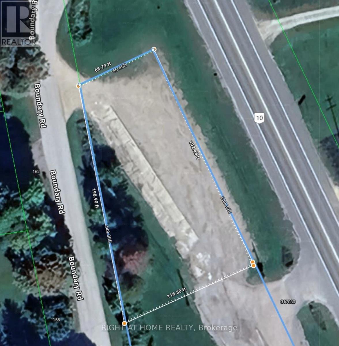317080 Highway 6 & 10 Highway Property Photo 1