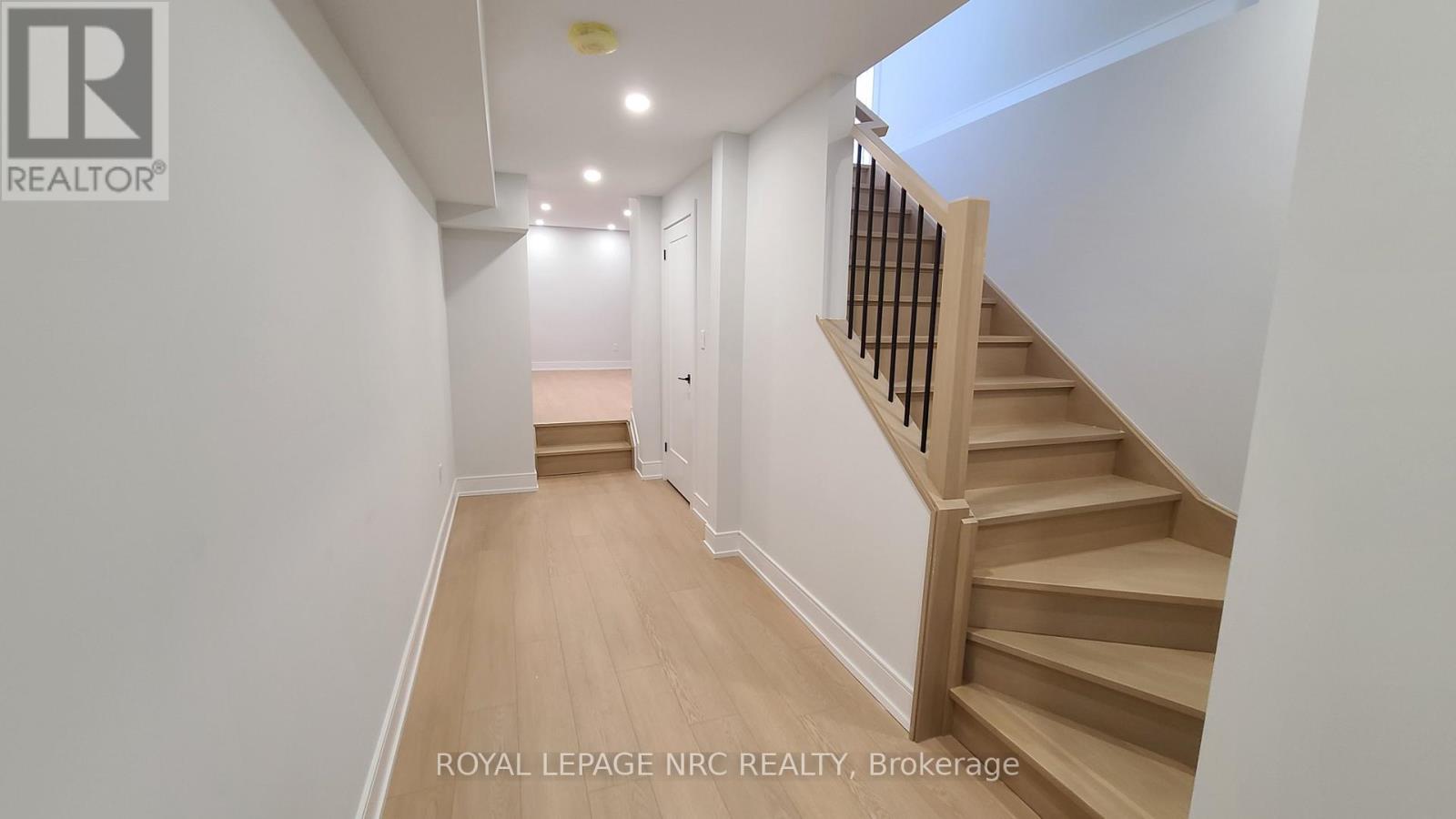 Lower - 7386 Splendour Drive Property Photo 5