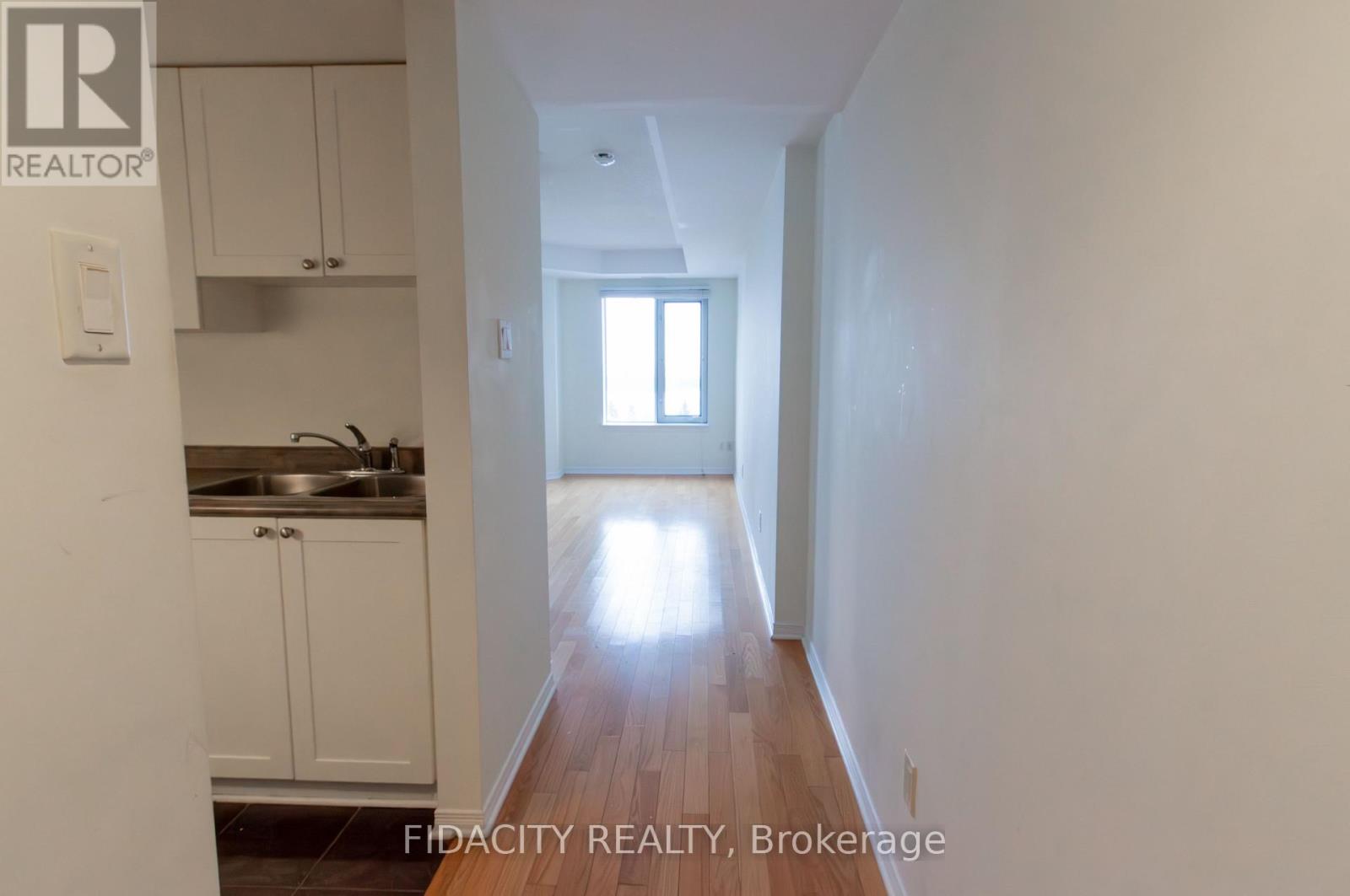 5c - 310 Central Park Drive Property Photo 2