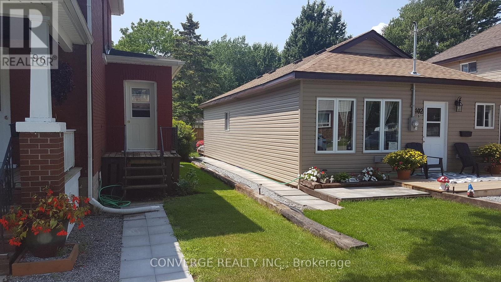 A - B - 102 Elm Street N Property Photo 1