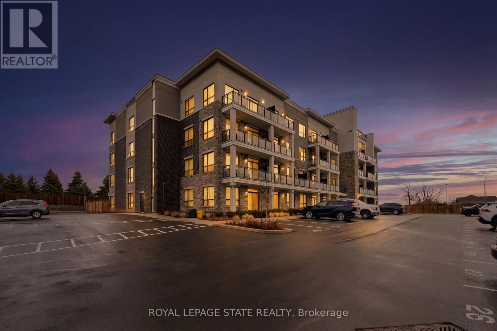 203 - 120 SPRINGVALLEY CRESCENT Property Photo 1
