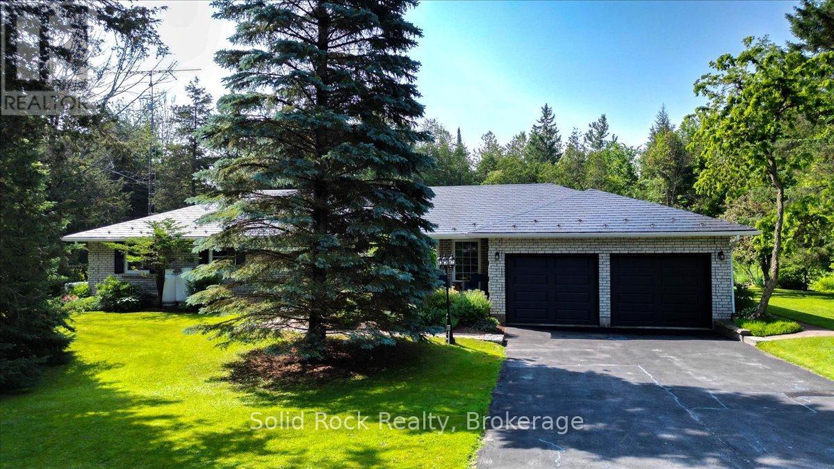 2255 10th Line W Property Photo 1