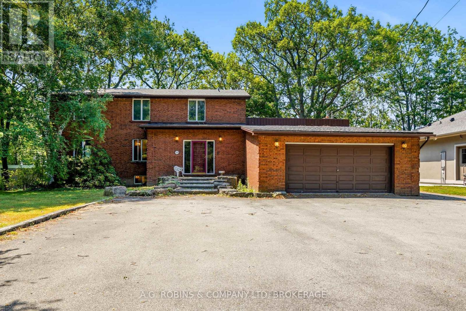559 LAKESHORE ROAD E Property Photo 1
