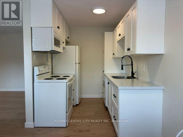 208 - 1172 HAMILTON ROAD Property Photo 1