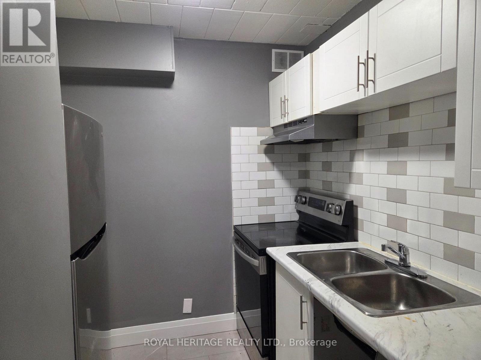 104 - 8800 WILLOUGHBY DRIVE Property Photo 1