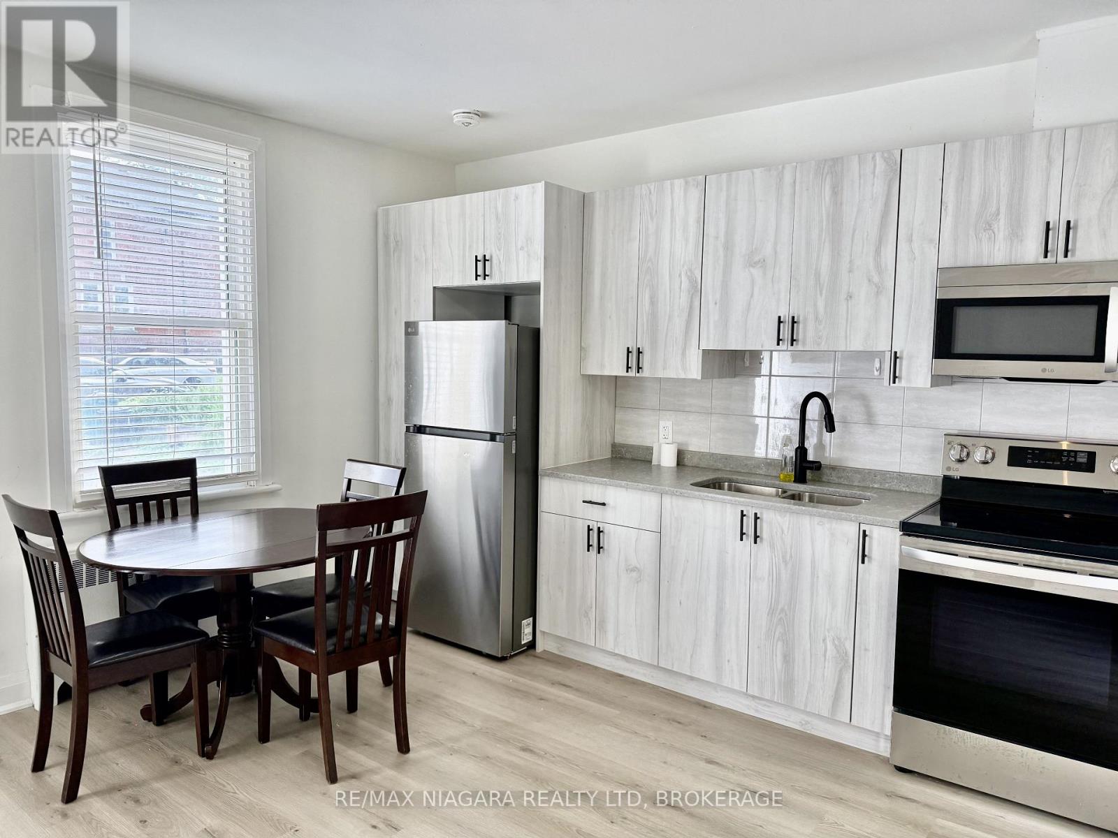 Unit 2 - 4711 River Road Property Photo 1