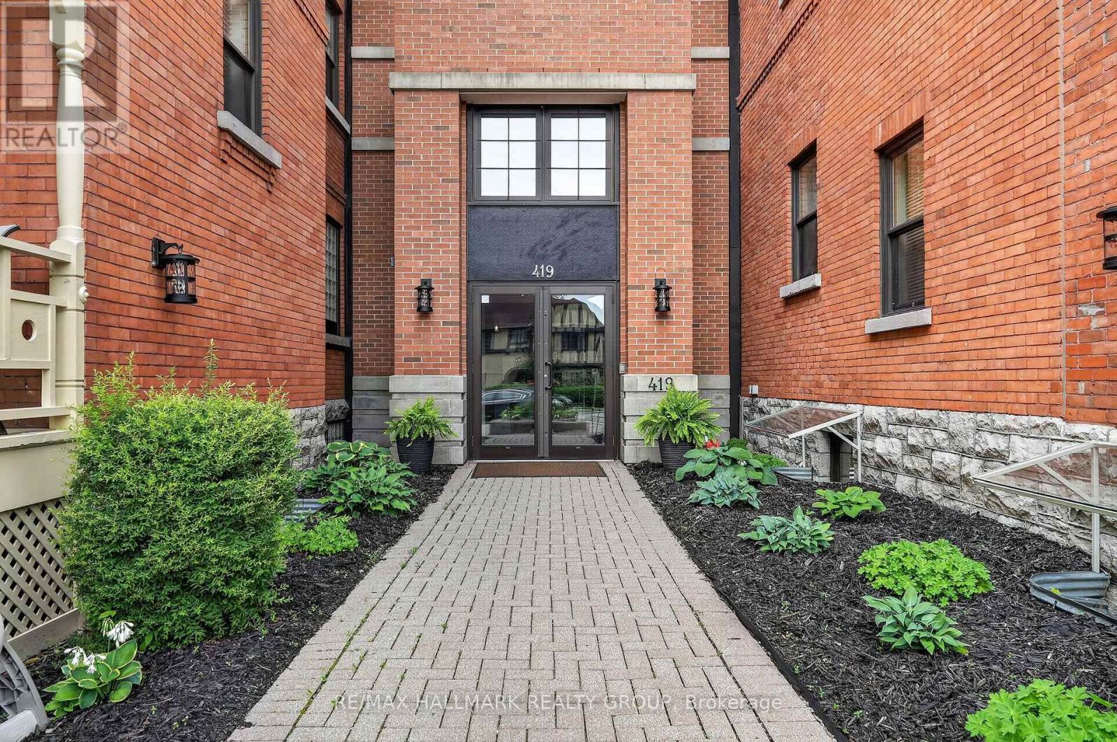 101 - 419 LAURIER AVENUE E Property Photo 1