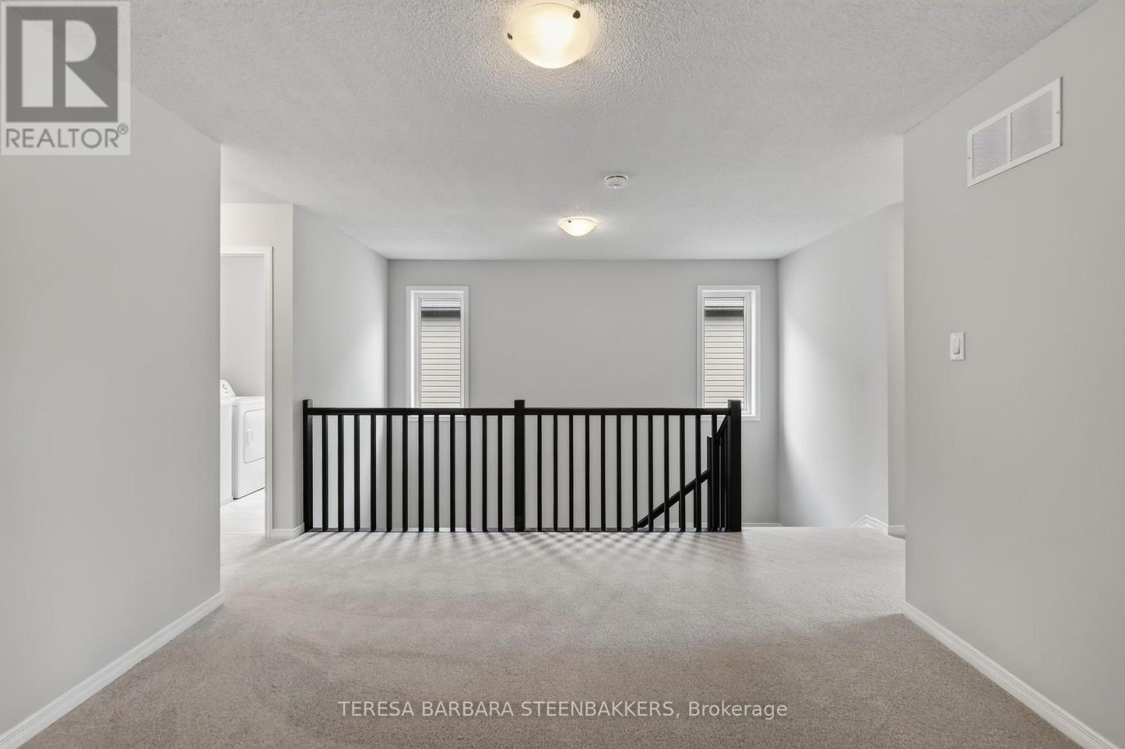 689 Taliesin Crescent E Property Photo 14