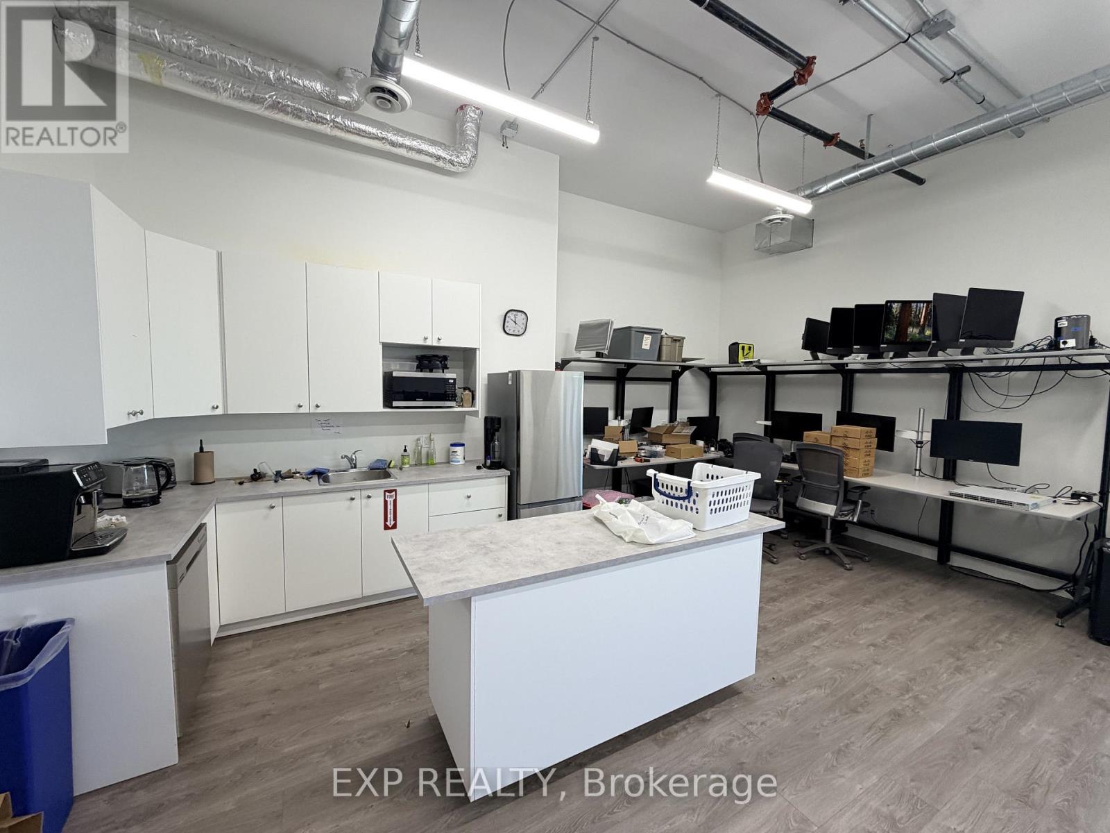 218 - 65 Denzil Doyle Court Property Photo 3