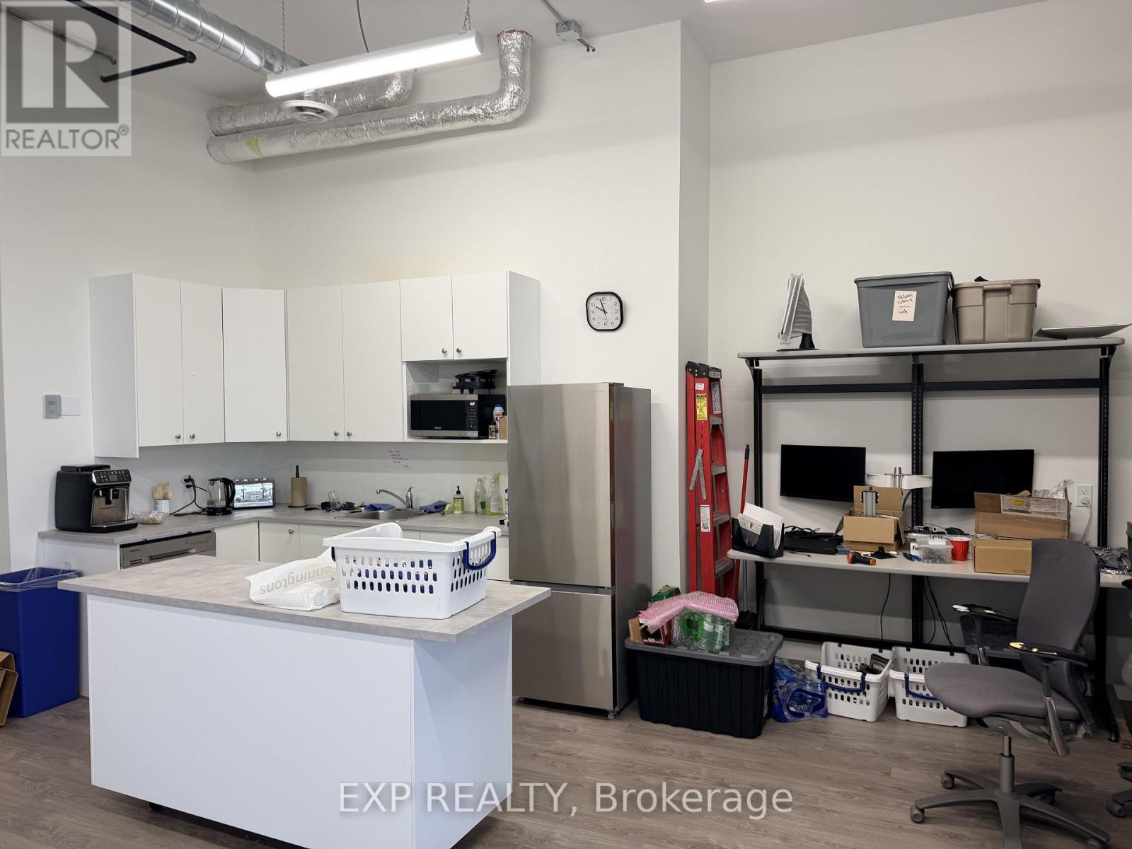 218 - 65 Denzil Doyle Court Property Photo 4