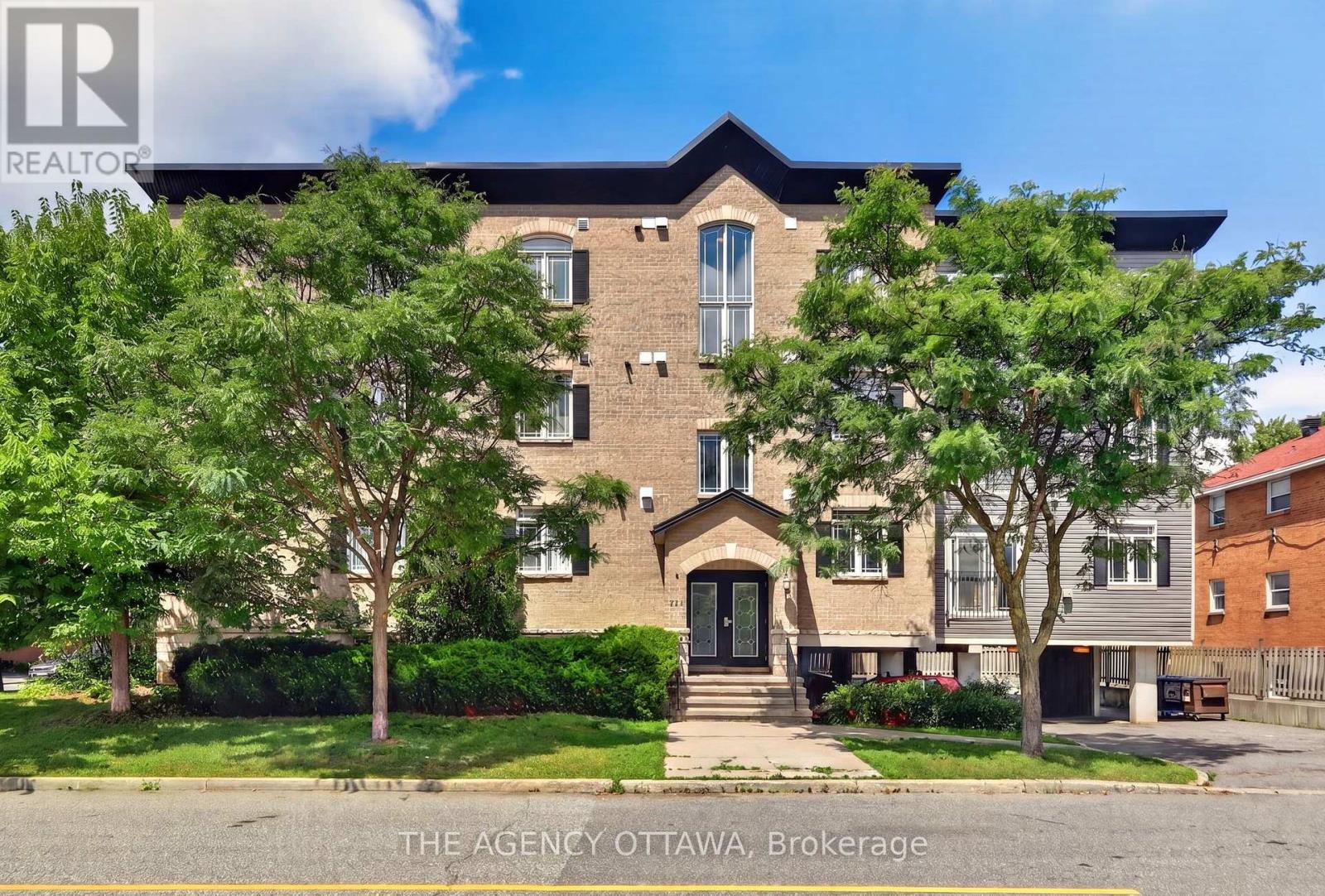 203 - 711 Churchill Avenue N Property Photo 1