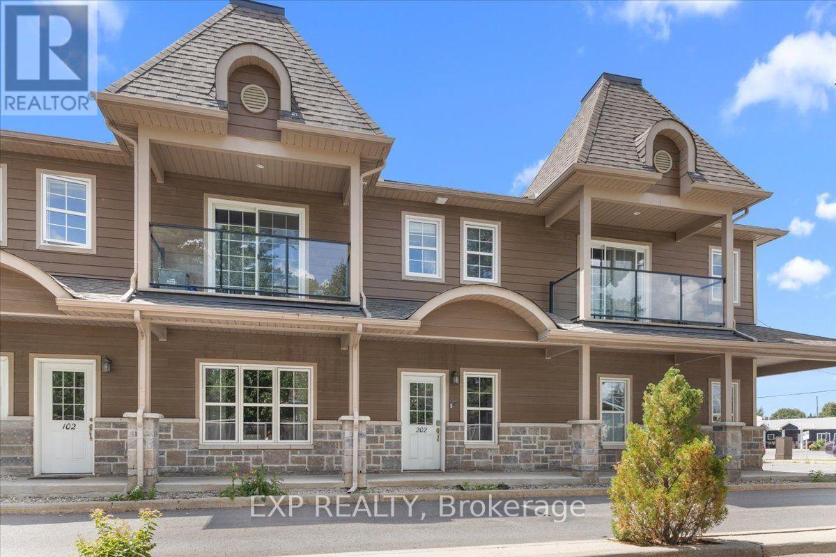 202 - 245 Equinox Drive E Property Photo 1
