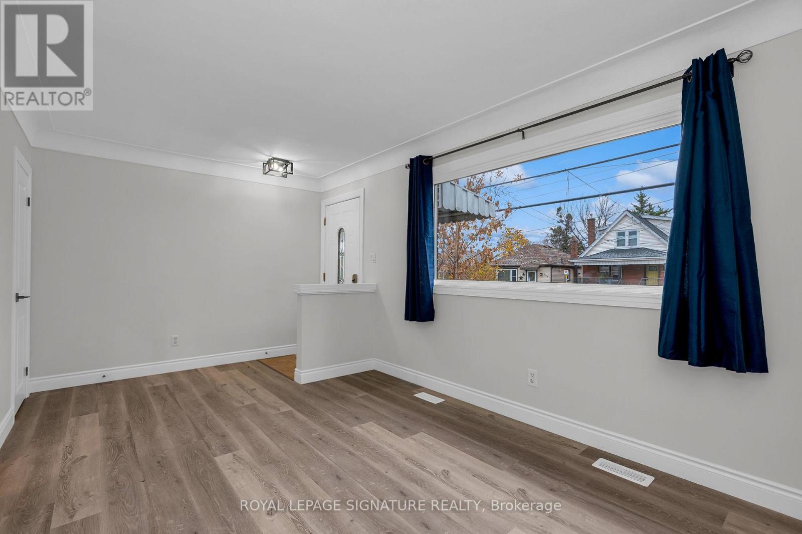 Main - 515 Queensdale Avenue E Property Photo 2