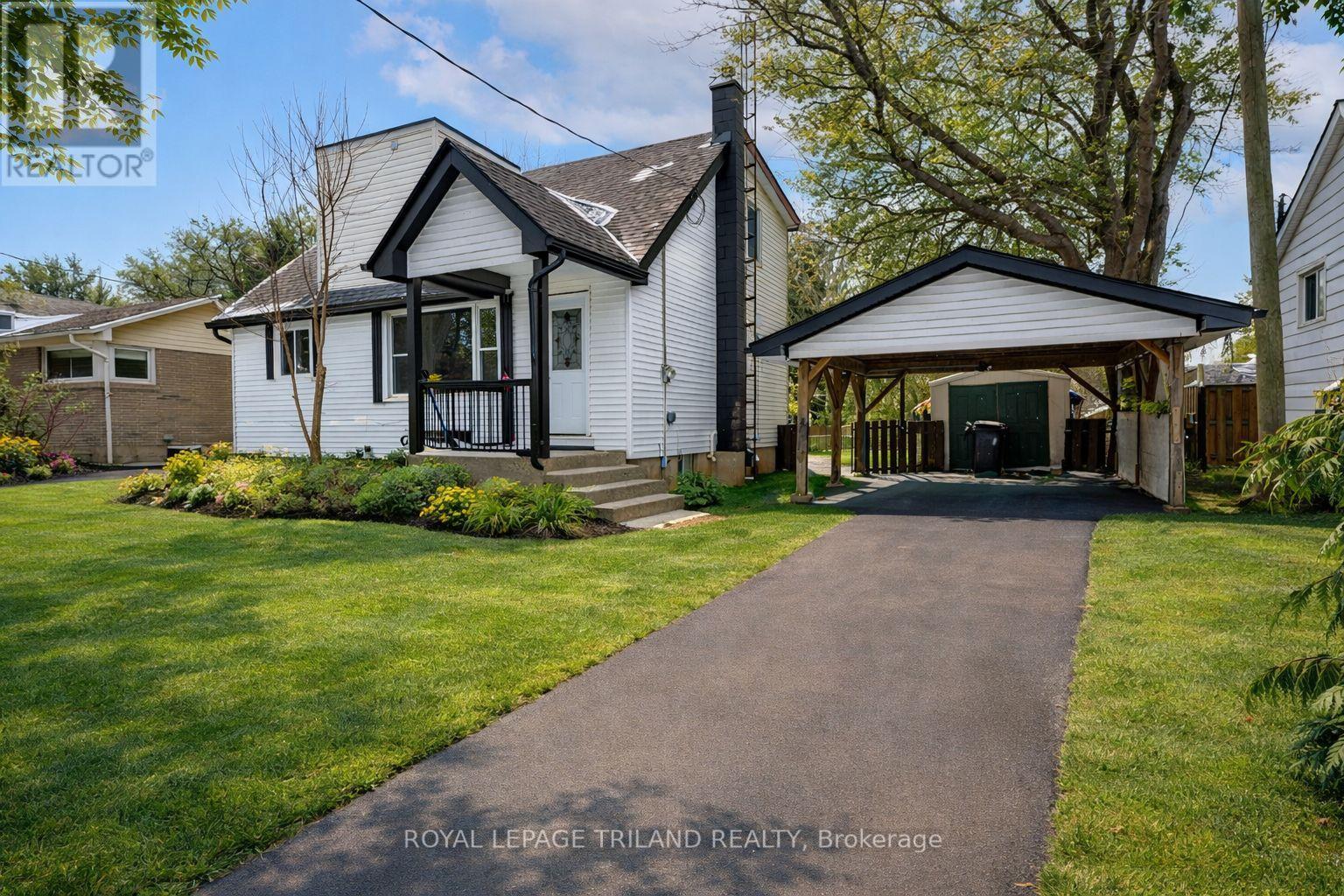 1223 SUNNINGDALE ROAD E Property Photo 1