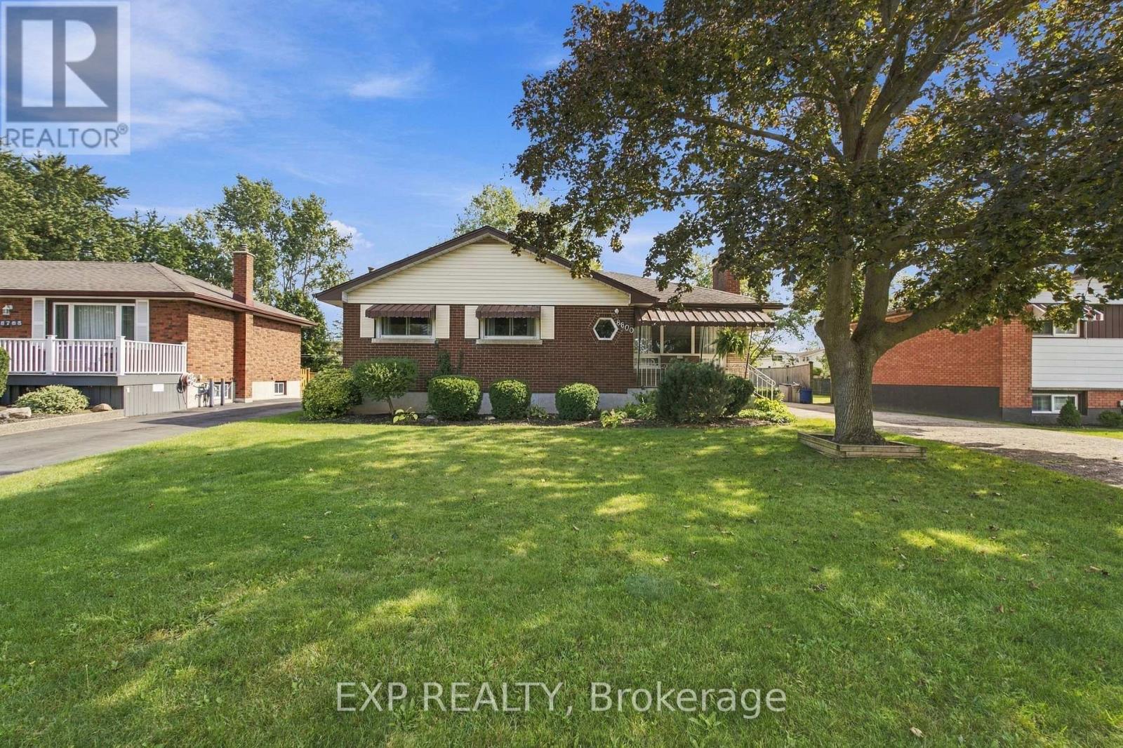 8800 Champlain Drive Property Photo 1